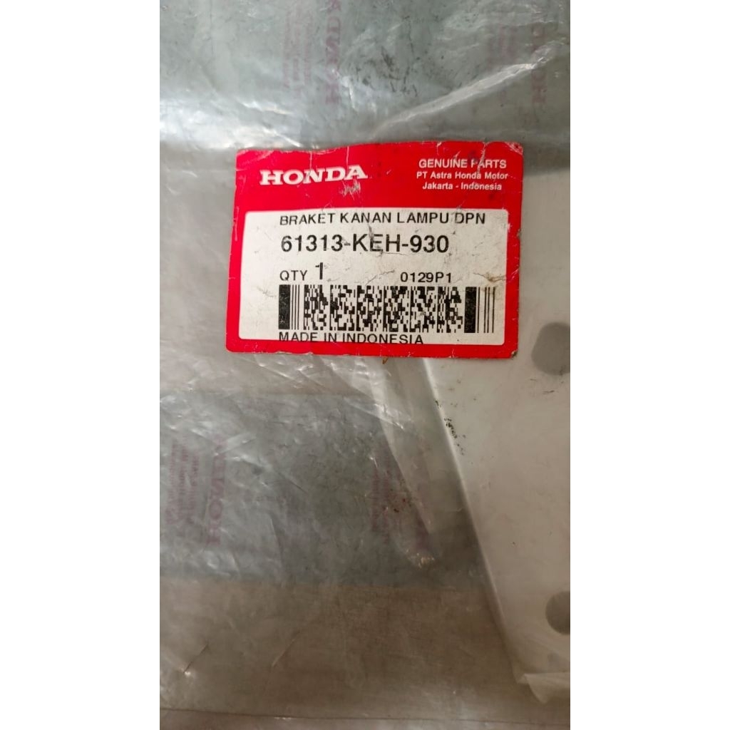 61313KEH930|Bracket Kuping / Dudukan Lampu Depan Kanan Honda Mega Pro Advance Original