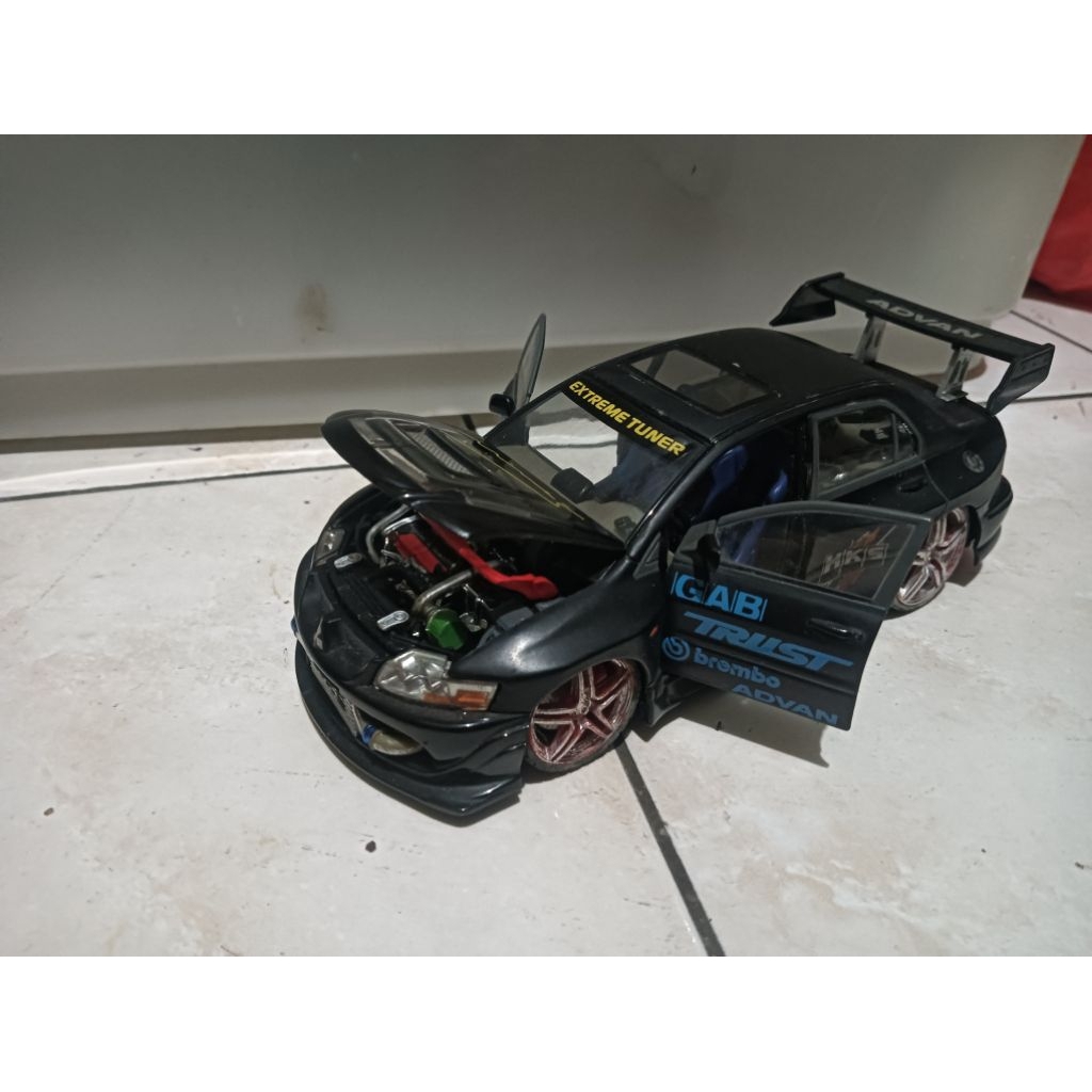 diecast Lancer evo skala 24 merk Kentoys