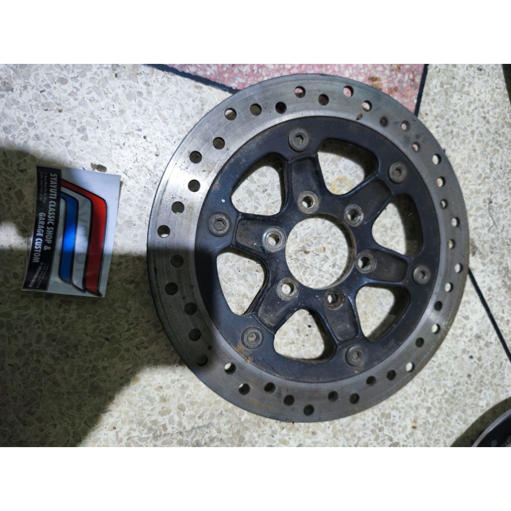 piringan cakram Tiger Revo original