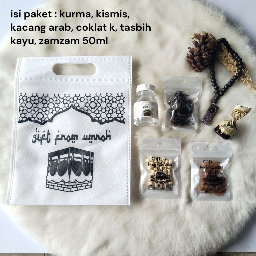 

Paket oleh oleh haji dan umroh kemasan tas godiebag putih plastik klip sablon / hampers souvenir makanan khas arab