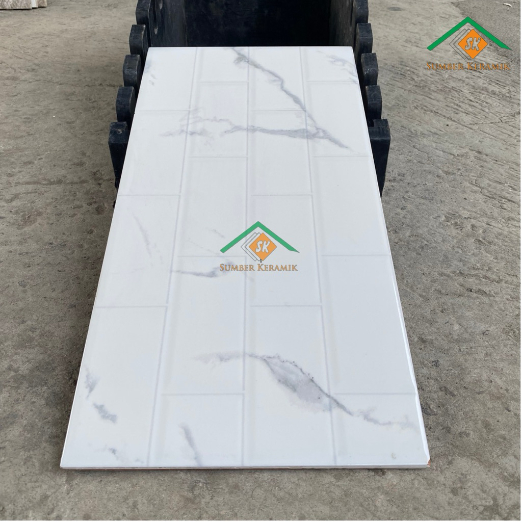 Keramik dinding statuario white 25x50 glossy uno
