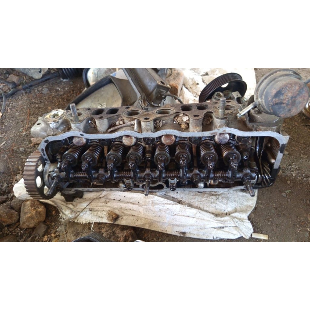 Cylinder head corona at 151