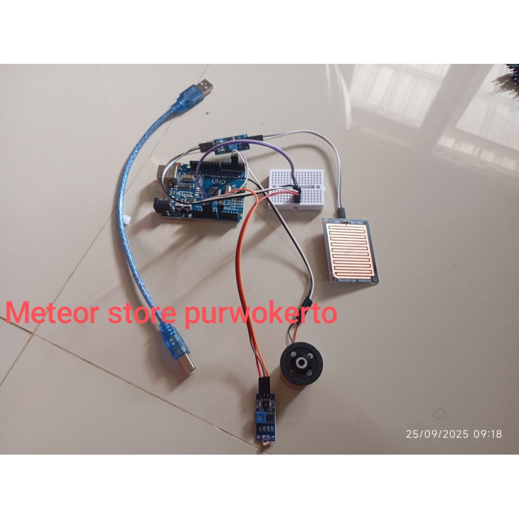 prototype sistem jemuran otomatis dengan arduino dan sensor hujan serta sensor cahaya