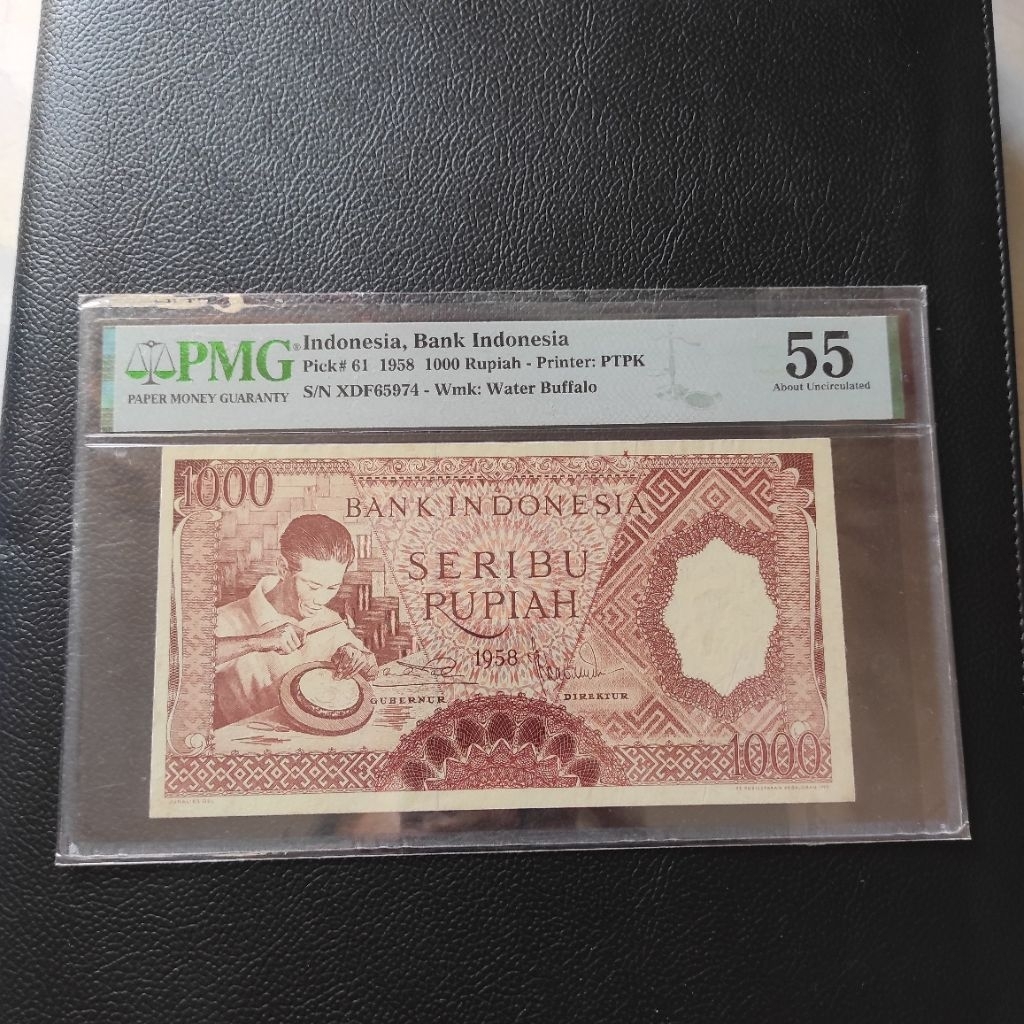 Uang 1000 rupiah pekerja coklat 1958 PMG 55