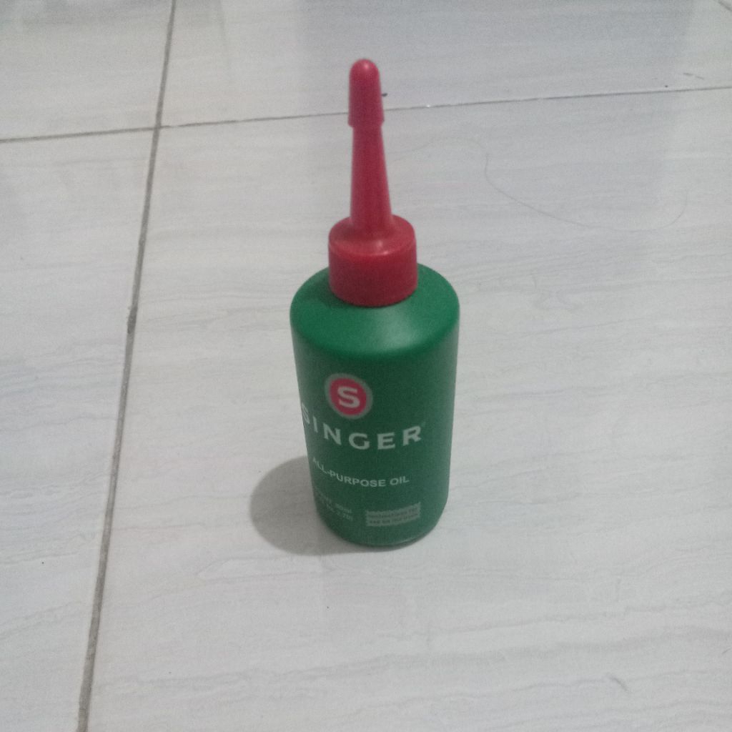 oli mesin jahit singer