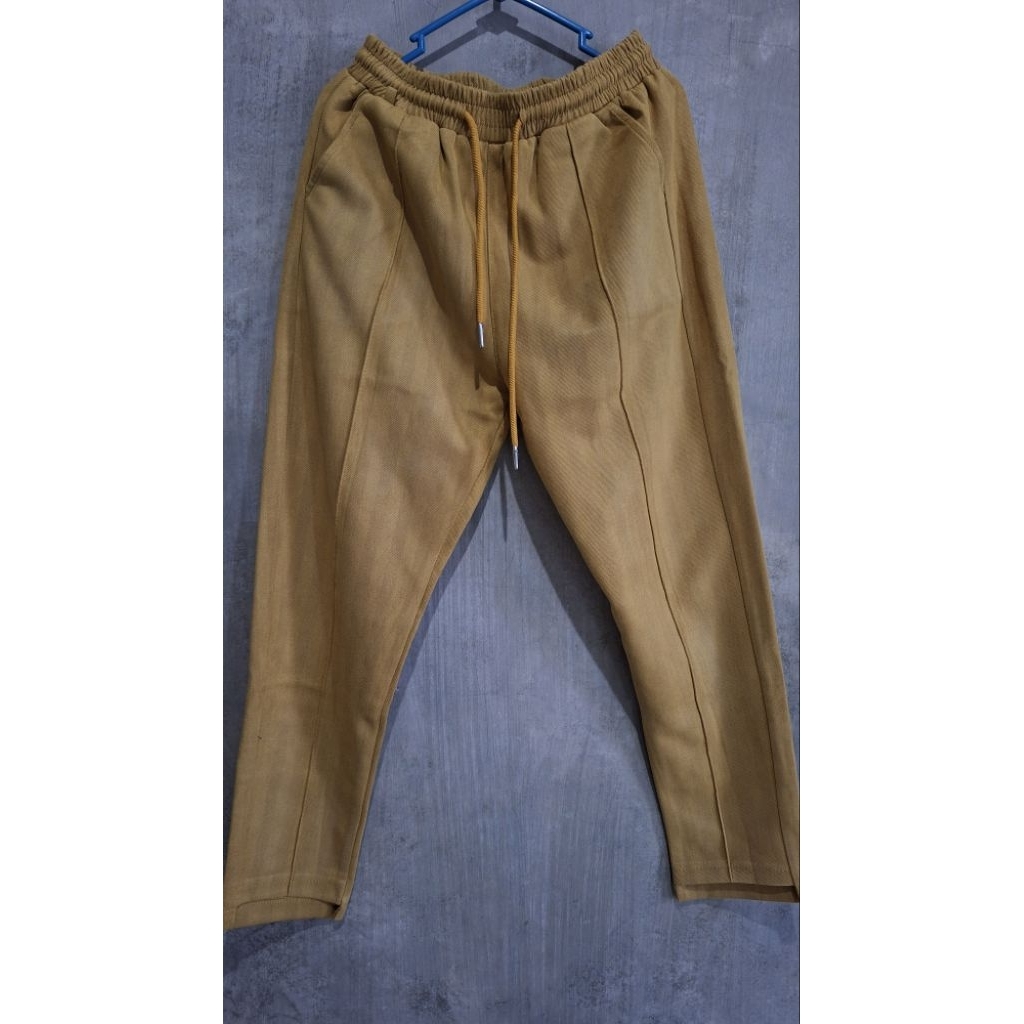 Celana Kuning Karet Tibesi