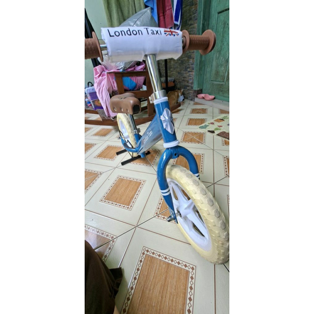 preloved balance bike london taxi