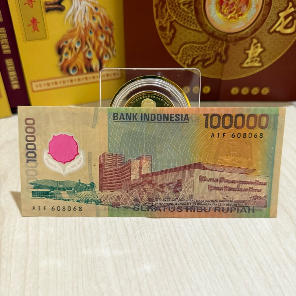 Uang kuno 100000 plastik tahun 1999 seri genap AIF 608068