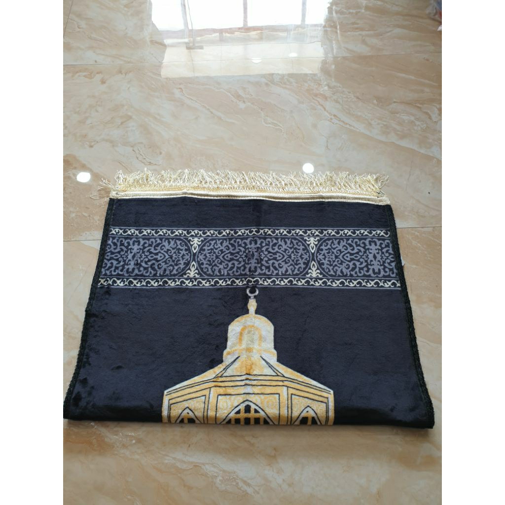 Sajadah Qisswah Tijarah