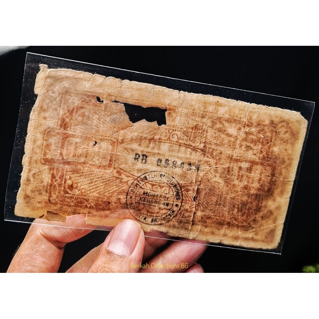 uang kuno 100 rupiah Prri ori tahun 1958 / 1959 asli