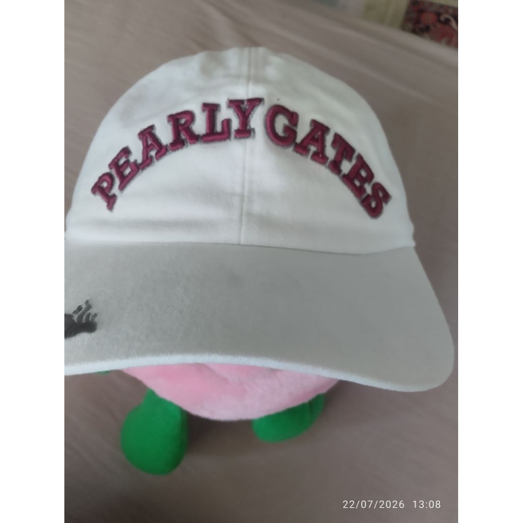 Topi Pearly Gates