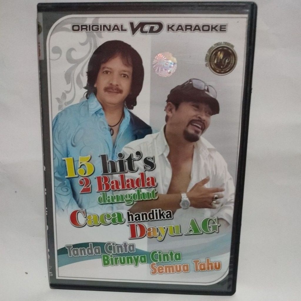 VCD KARAOKE 15 HITS 2 BALADA DANGDUT CACA HANDIKA & DAYU AG