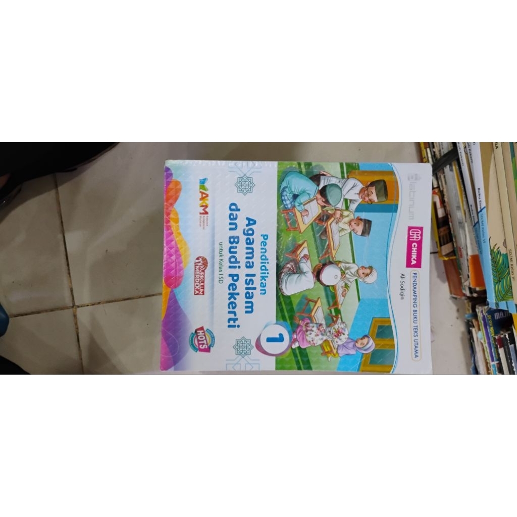 Buku bekas pendidikan agama islam dan budi pekerti kelas 1 SD MI kurikulum merdeka tiga serangkai pl
