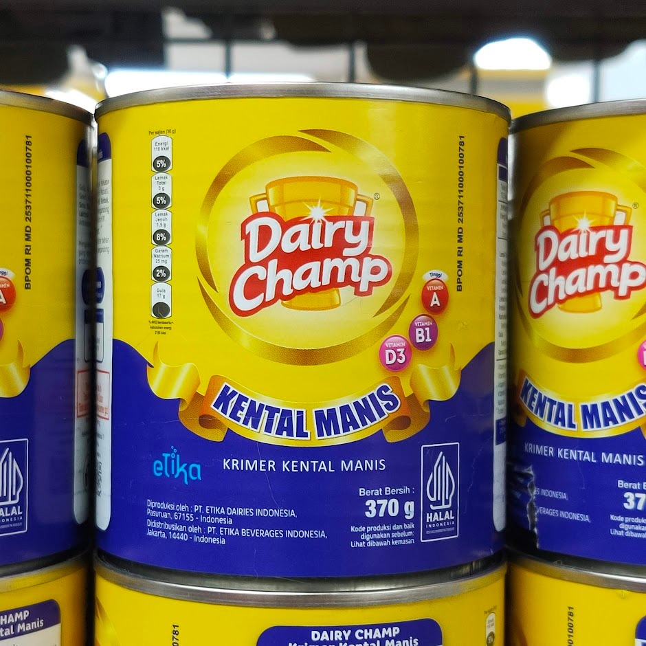 

Krimer Kental Manis DAIRY CHAMP Kaleng 370gr Susu Kental Manis SKM