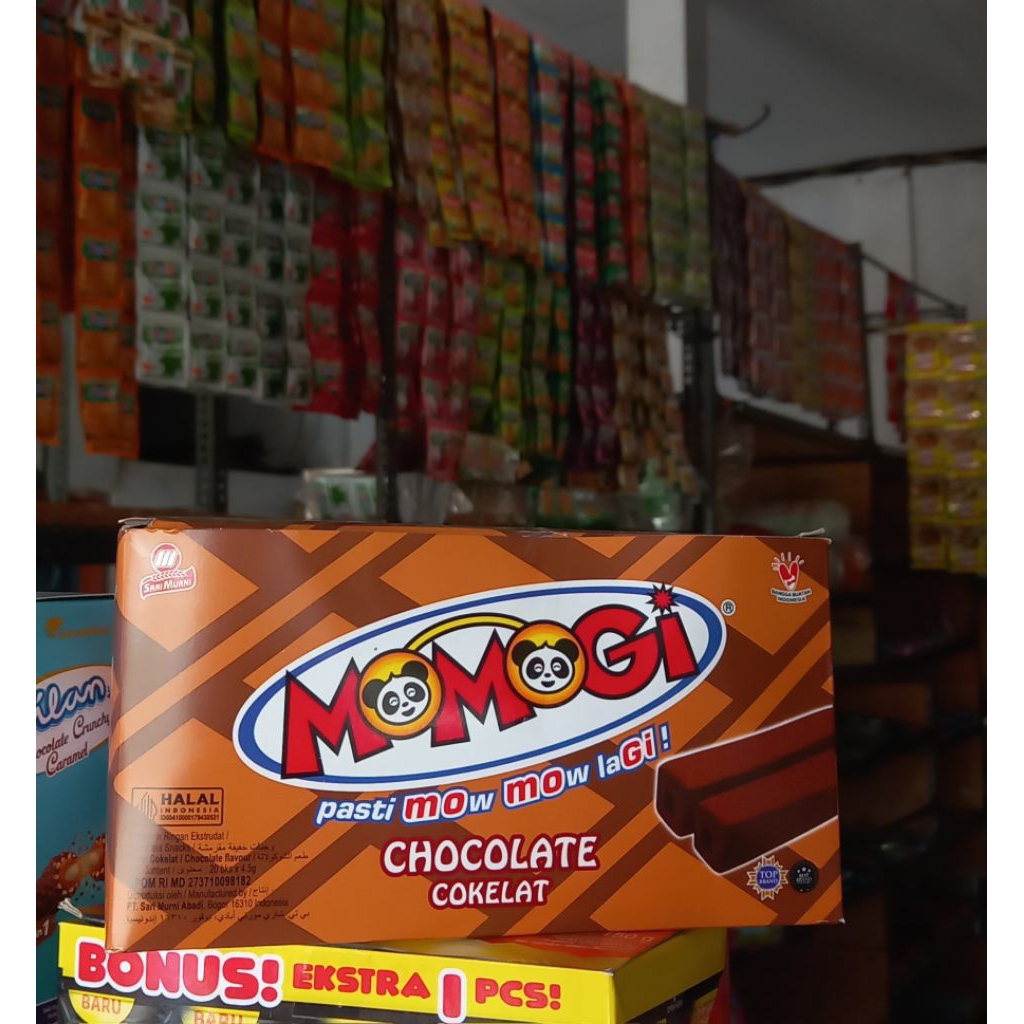 

Momogi Cokelat Cappucino Keju Jagung Bakar Tutti Frutti 1 box isi 20 bks x 4,5 gram
