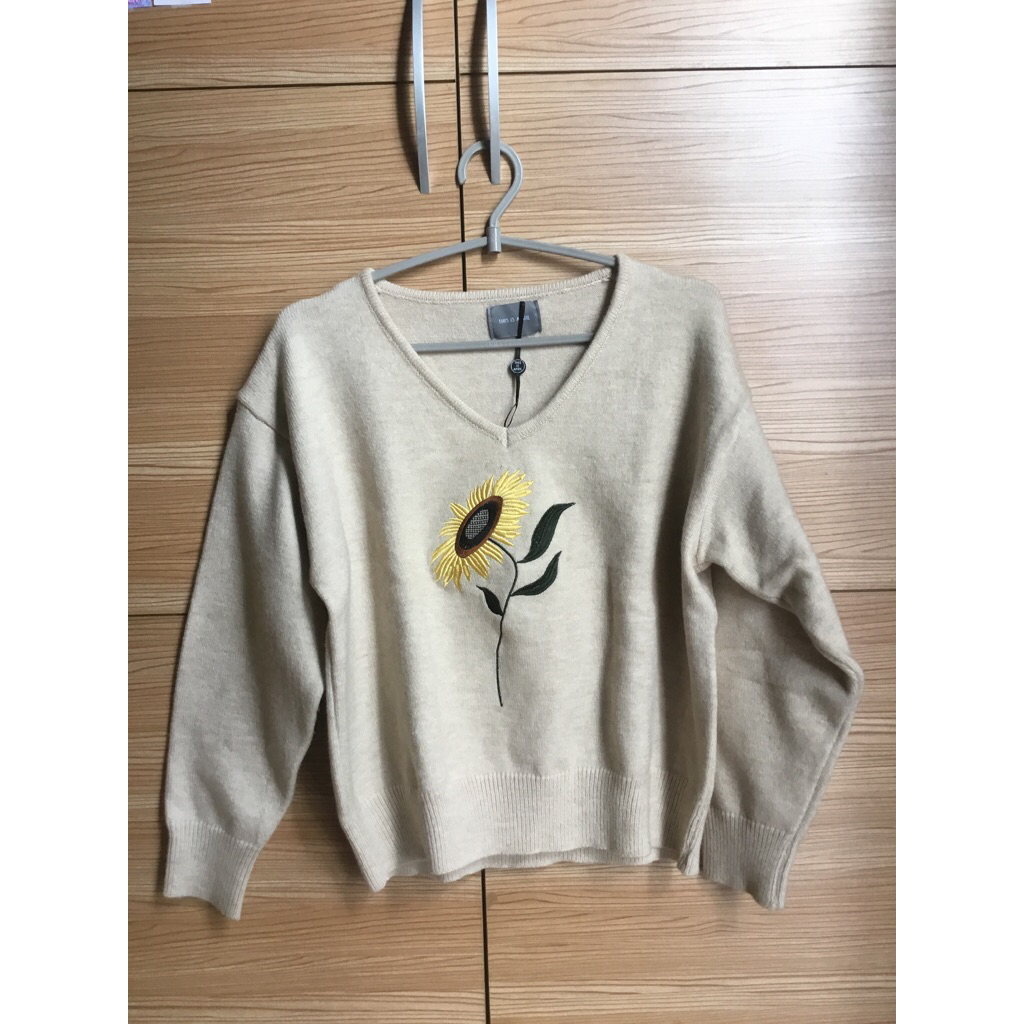 this is april sunflowers sweater