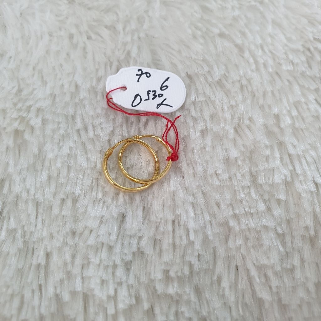 anting bulat emas kadar 70% berat 0,53gram