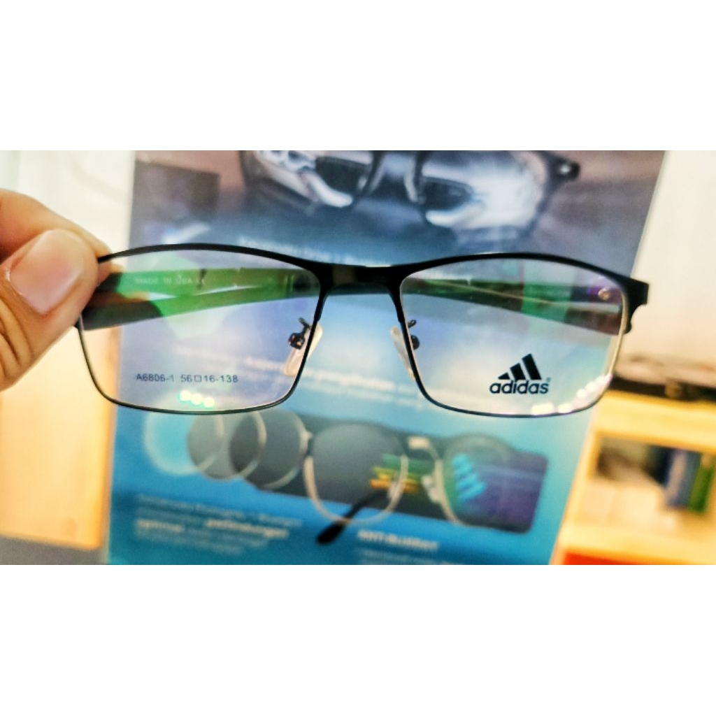 KACAMATA PRIA MINUS ANTIRADIASI PHOTOCROMIC BLURAY