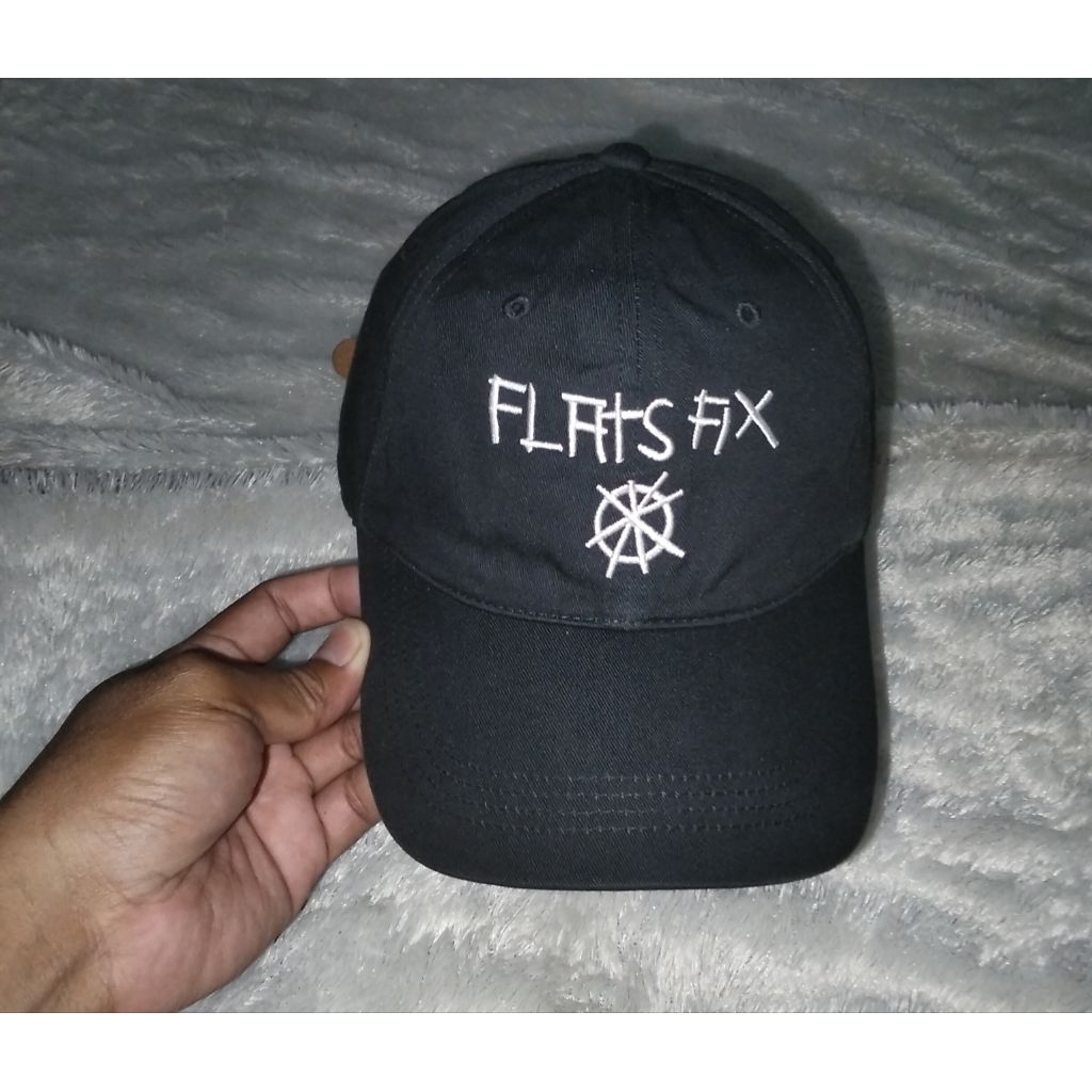 Topi UNIQLO kolep JEAN-MICHEL BASQUIAT setelan kulit Second