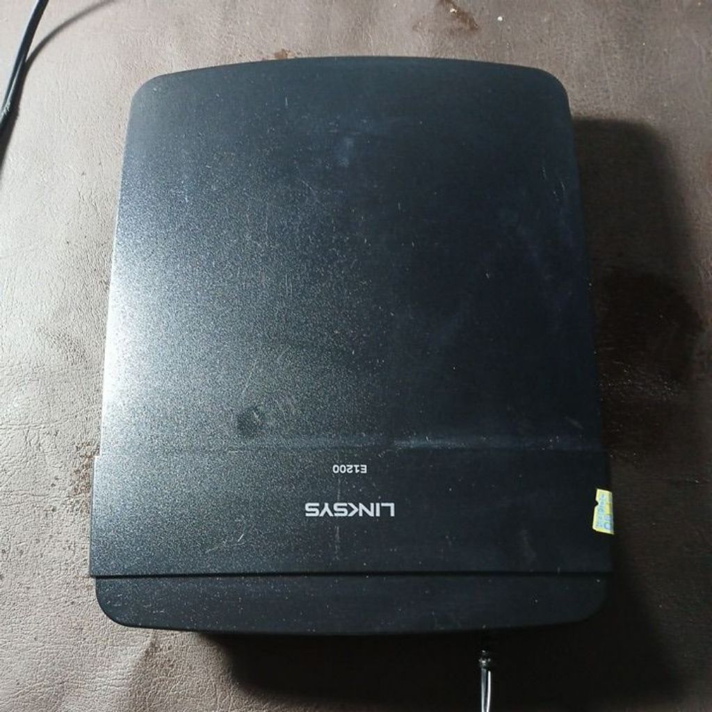 dijual Linksys E1200 Wireless Router 300Mbps modem AP WAN PPPoE bekas normal