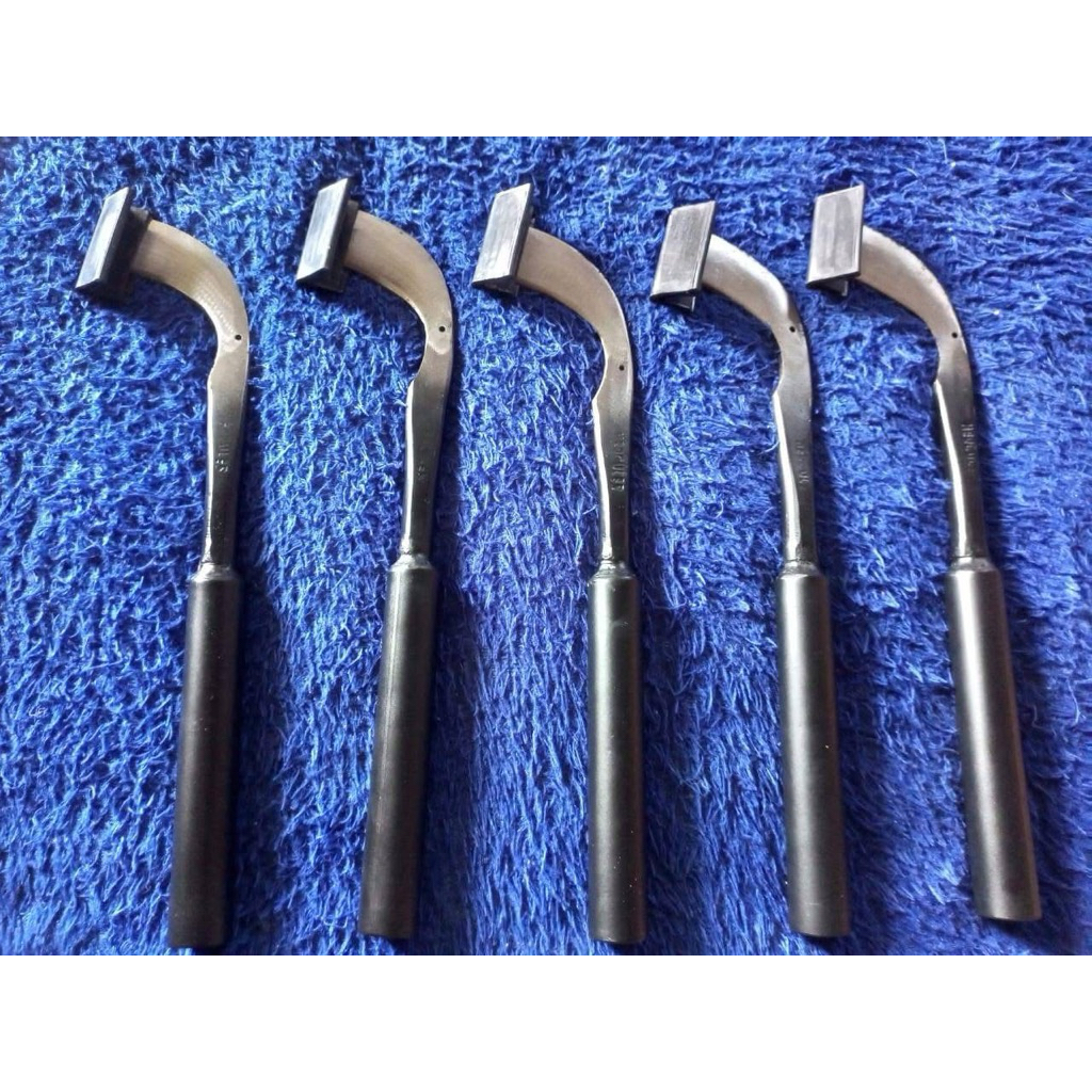 pisau sadap karet/alat menoreh kebun karet