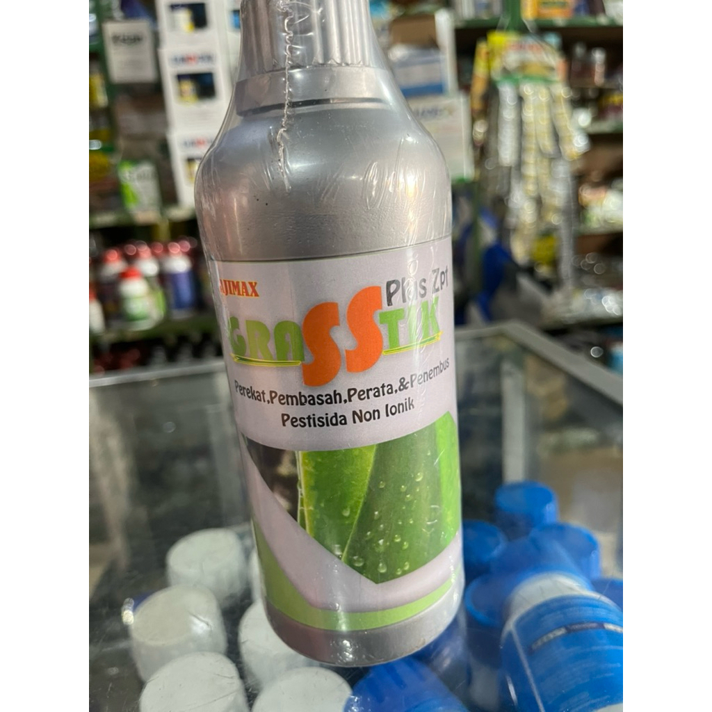 Grasstic 500ml plus ZPT Ajimax , perekat,pembasah,perata,& penembus pestisida non ionik