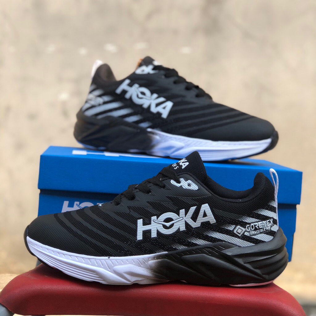 sepatu hitam putih ringan pria wanita