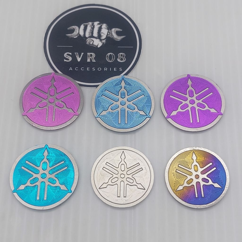 EMBLEM LOGO GARPUTALA TAMENG DEPAN MIO SPORTY SMILE SOUL NMAX AEROX DIAMETER 3CM TITANIUM VIETNAM