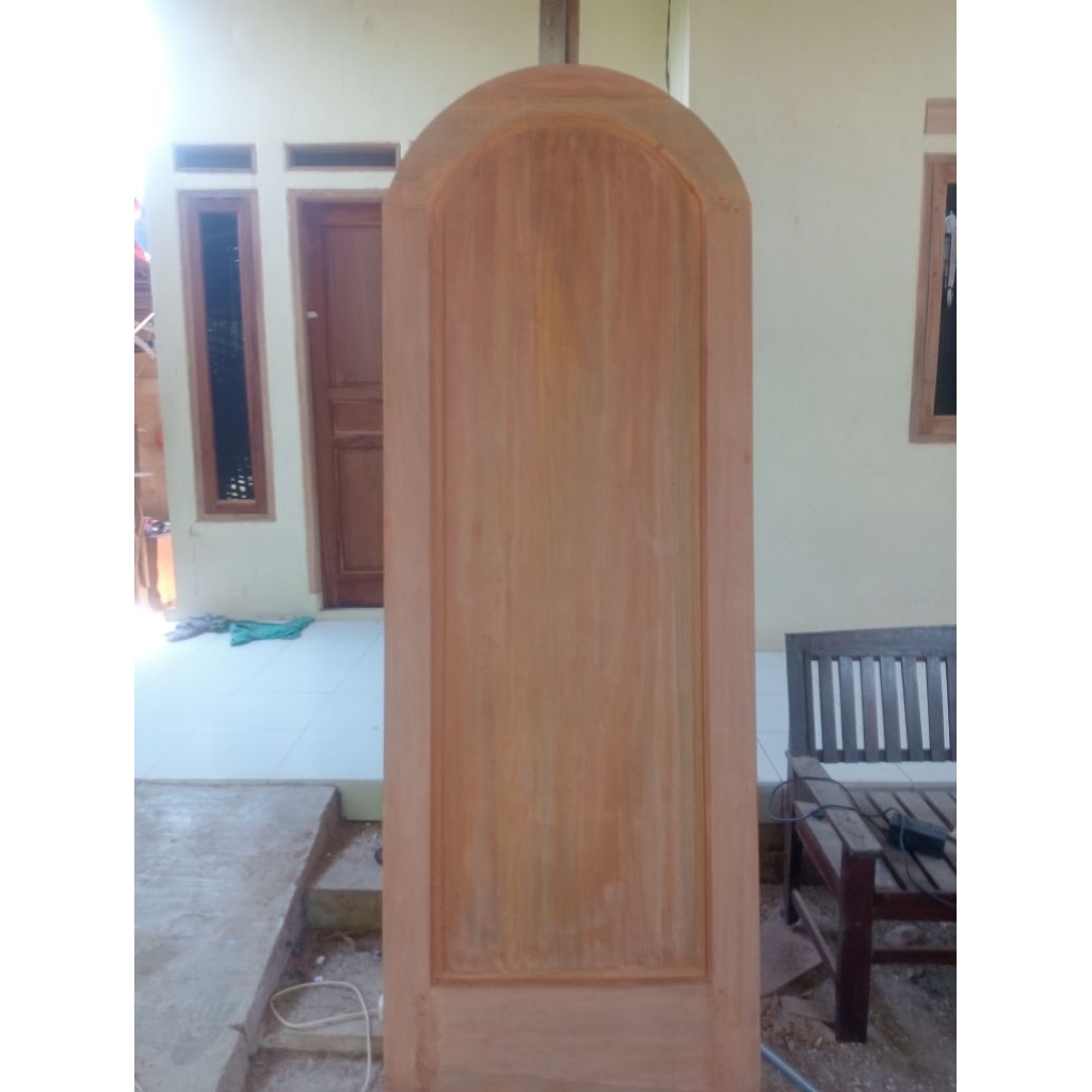 daun pintu lengkung kayu kamper