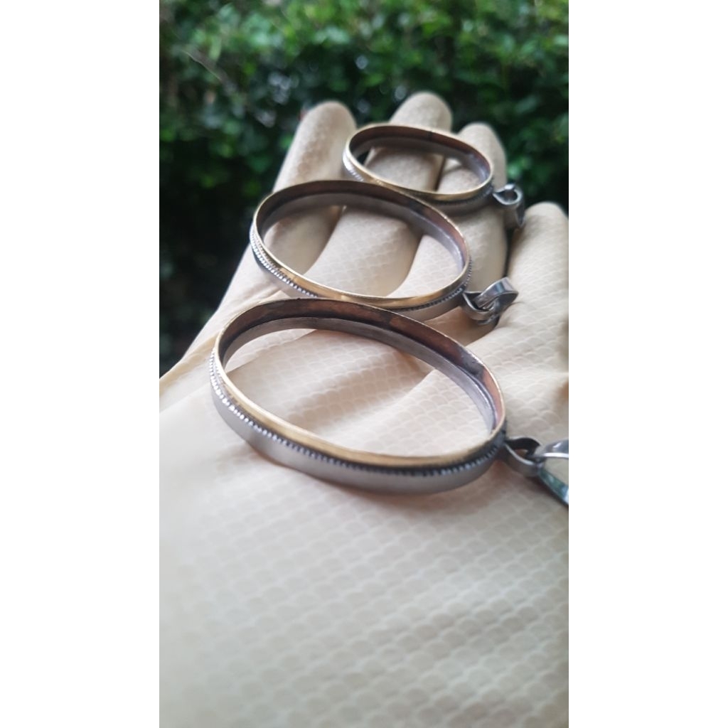 emban ikat liontin  monel super doff handmade