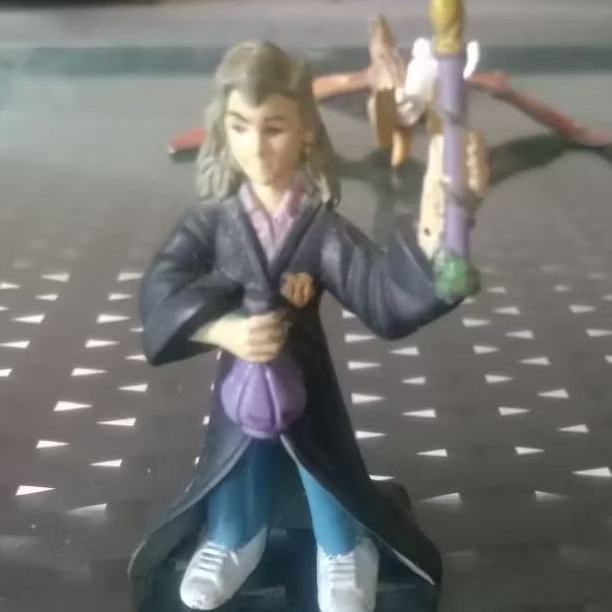 ACTION FIGURE HARRY POTTER -  HERMIONE GRANGER 7 Cm + KERBEROS MCFARLANE