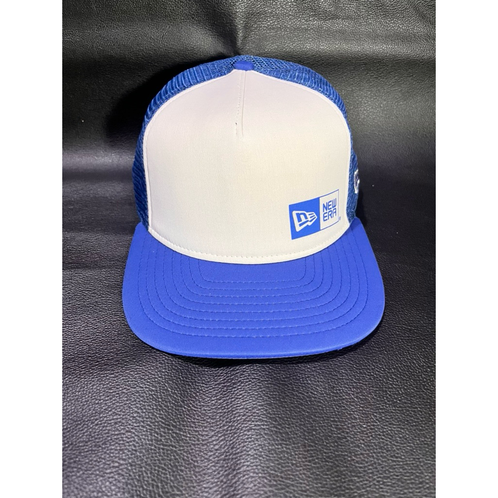 topi new era trucker