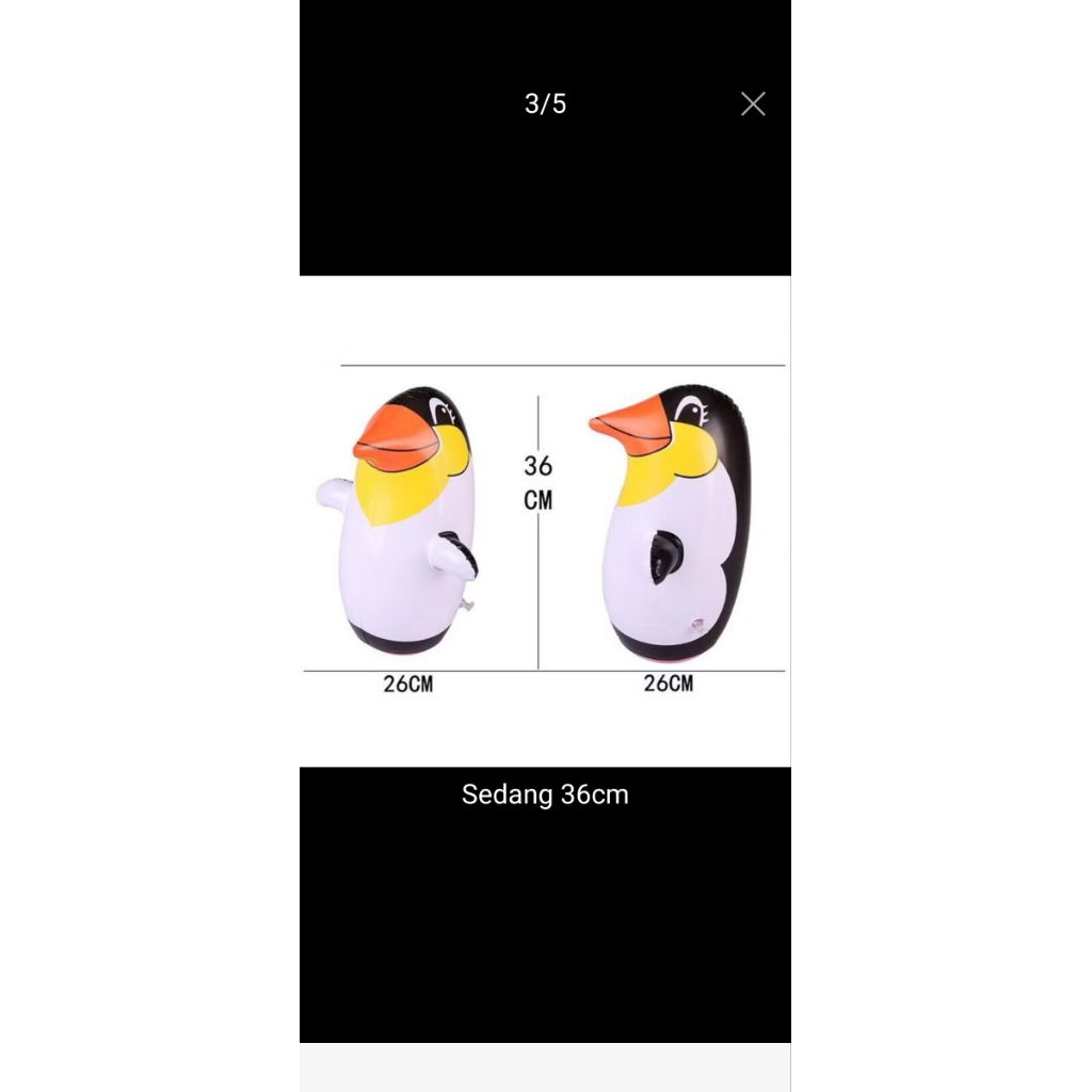balon pinguin biru berdiri