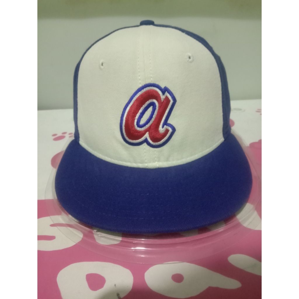 Topi logo A