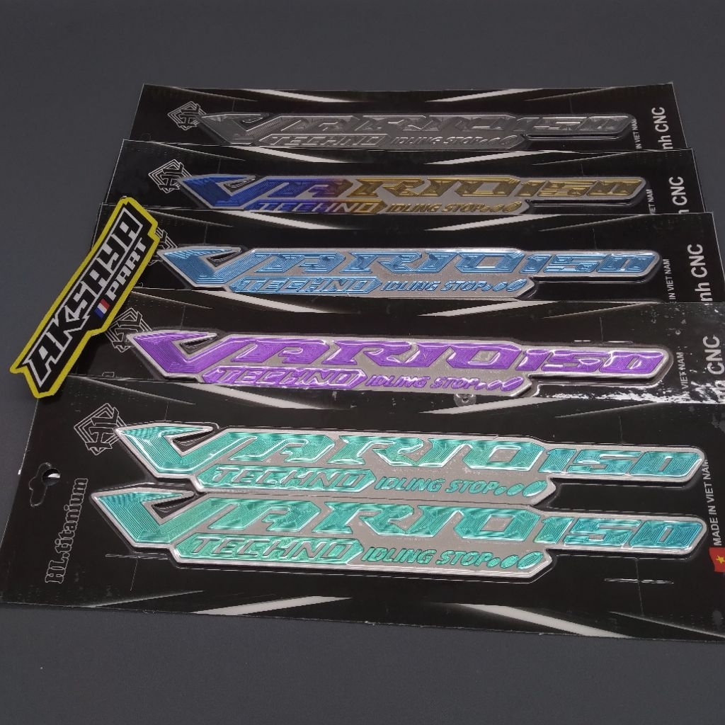 EMBLEM LOGO VARIO TECHNO 150 IDLING STOP TITANIUM ORIGINAL VIETNAM