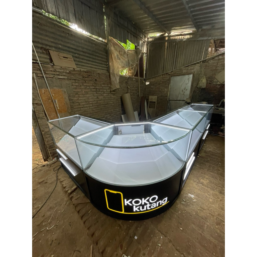 etalase konter hp minimalis sudut kaca lengkung