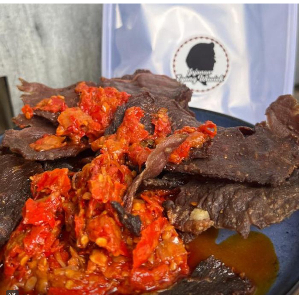 

Keripik Dendeng Sapi Kering Sambal Balado ala Minang asli Padang Merek Jajanan Eyang Wiwiek