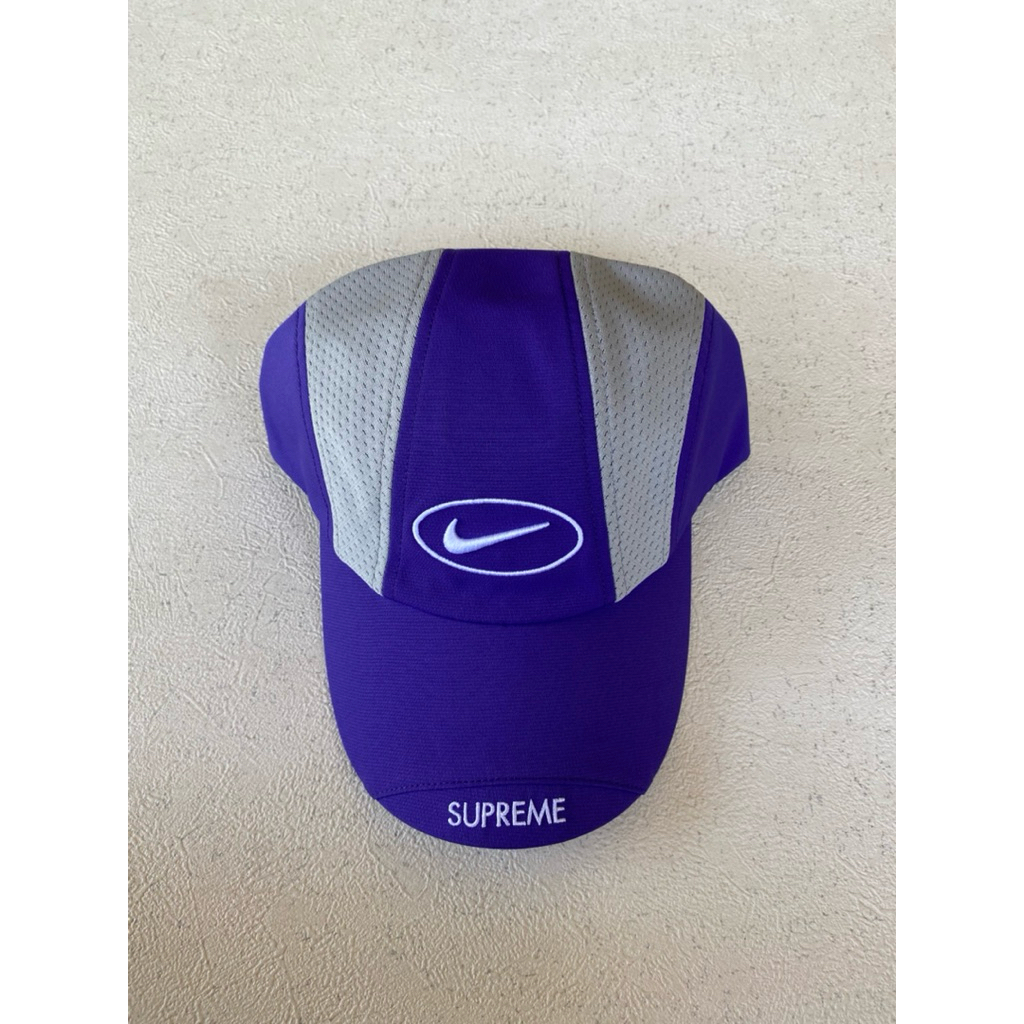 topi running supreme x Nike running cap fw25.