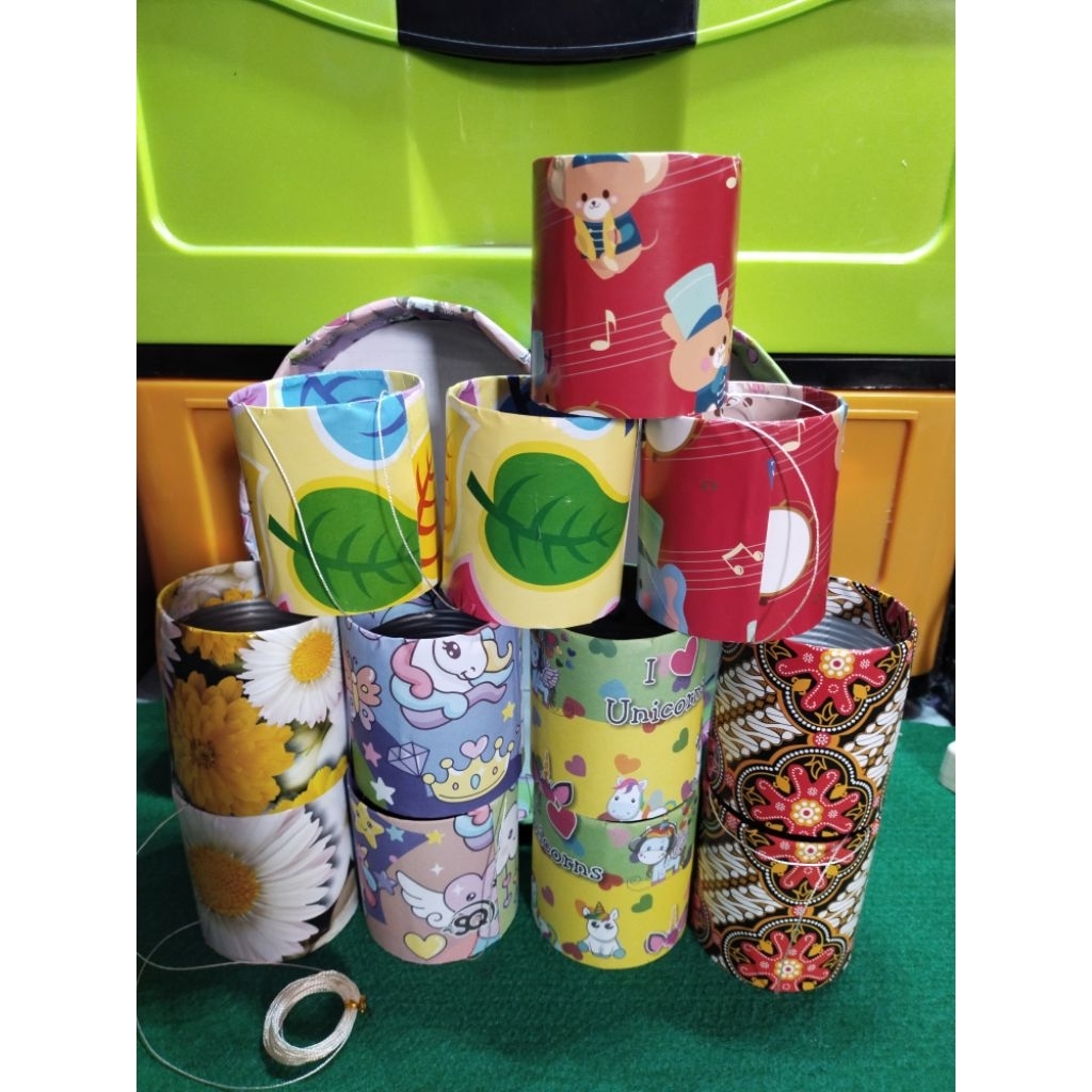 Mainan telepon kaleng motif sampul