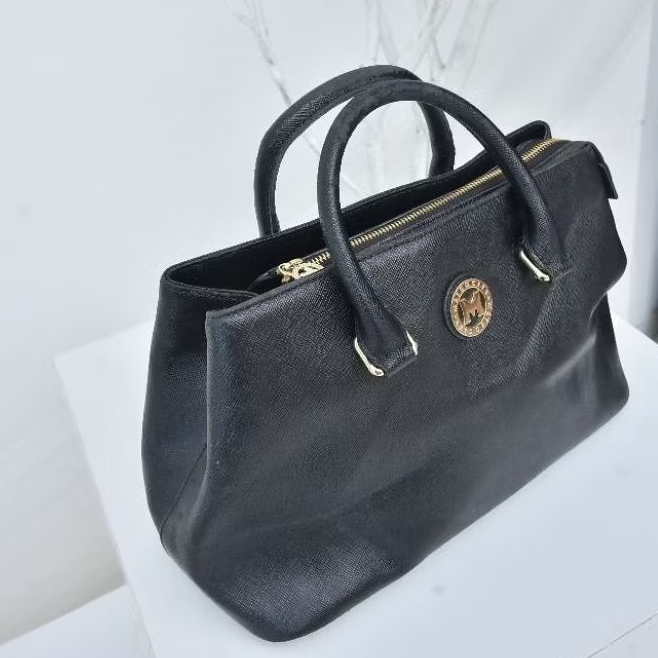 Tas kulit merk Metro City