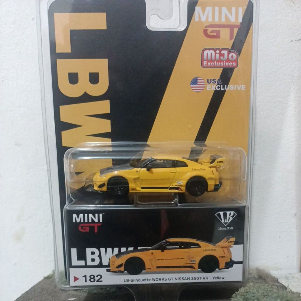 Mini GT// 182 LB-Silhouette Works GT Nissan 35GT-RR Ver.1 - Yellow (Blister) - Free Protektor