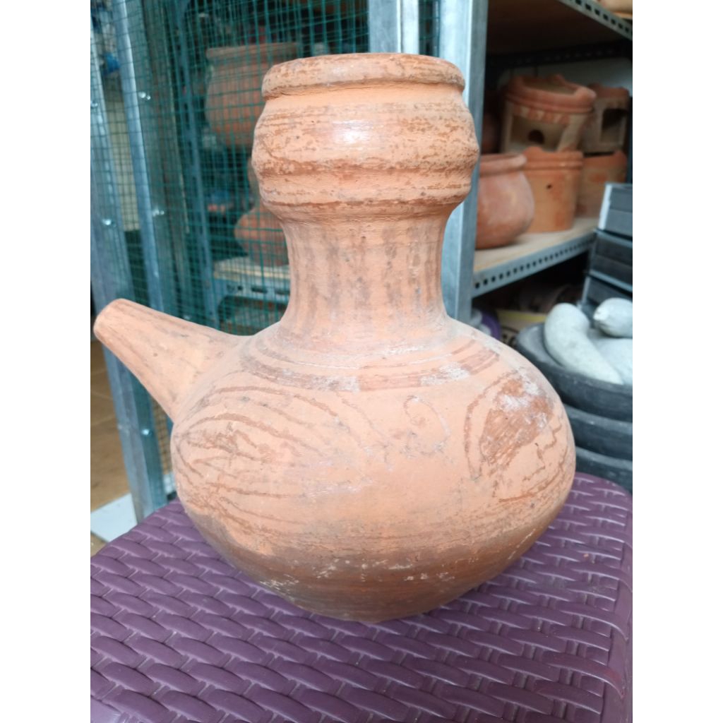 kendi tanah liat air minum