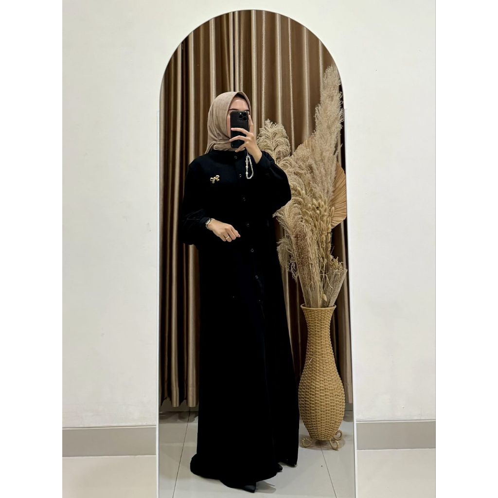 Gamis jumbo kancing depan lengan balon bahan Kringkel polos premium