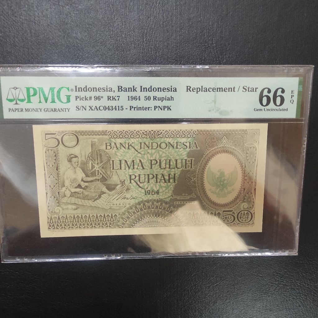 Uang 50 rupiah Seri Pekerja Tangan 1964 Replacement (PMG 66 EPQ)