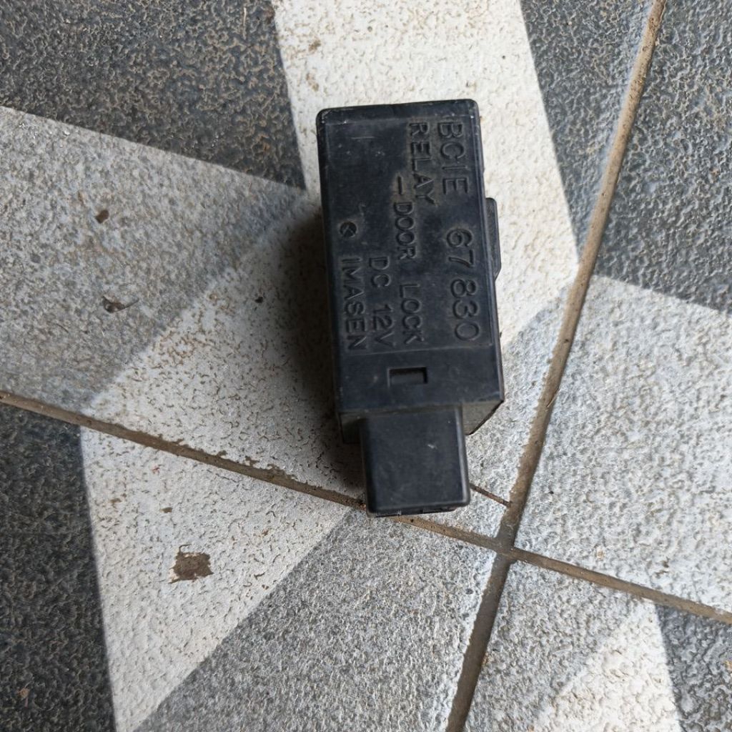 relay doorlock mazda lantis familia lynx