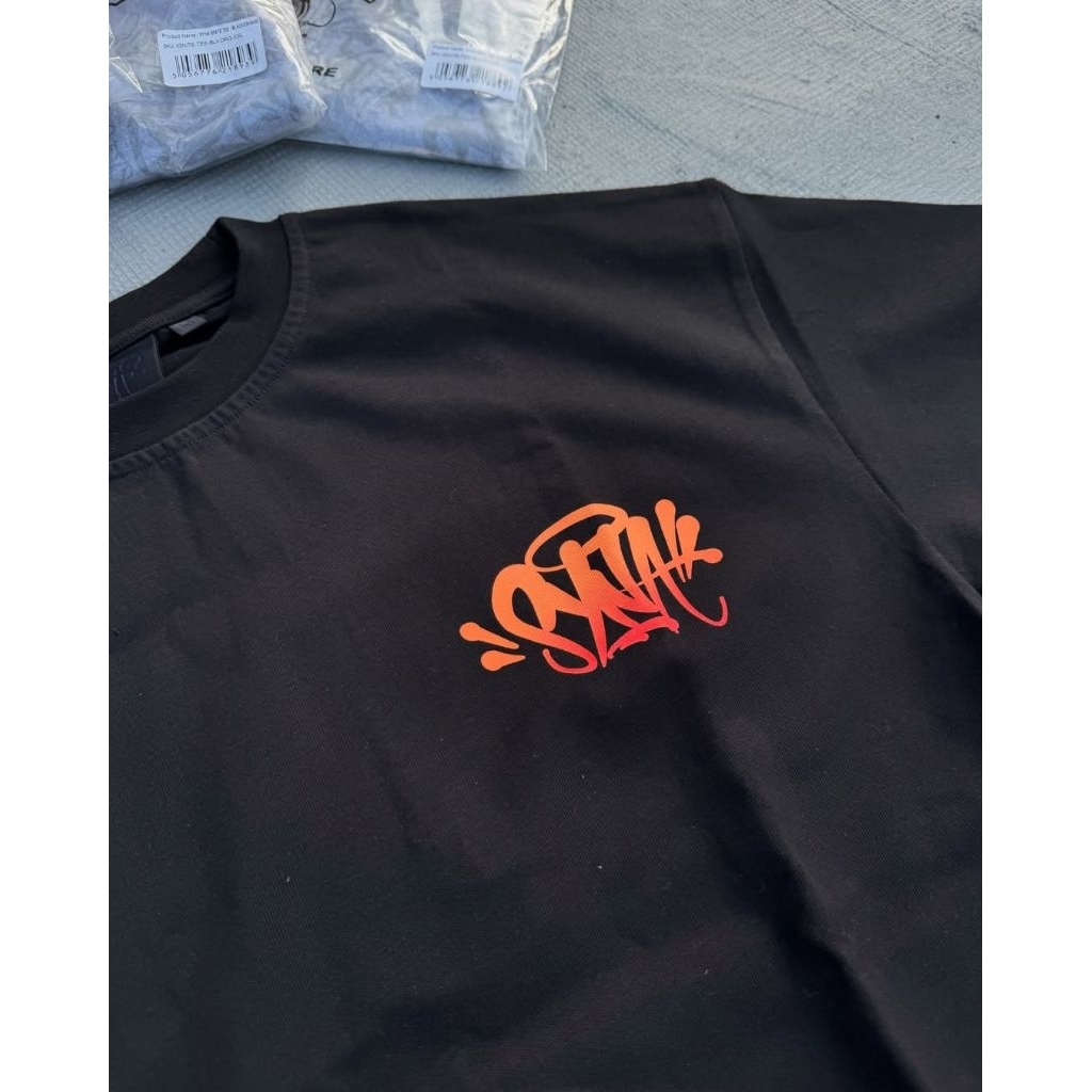 syna world tees