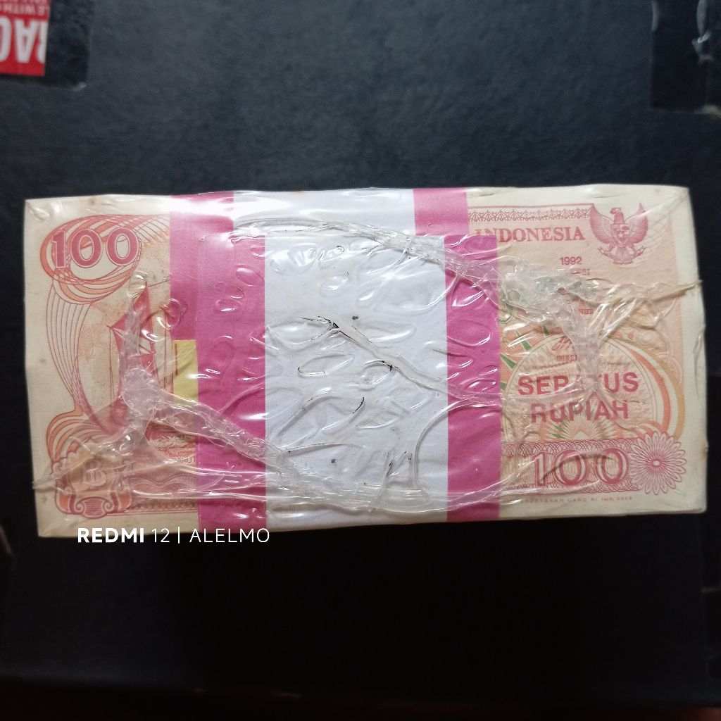brut atau 1000 lembar urut uang kertas 100 rupiah pinisi tahun 1992 baru asli