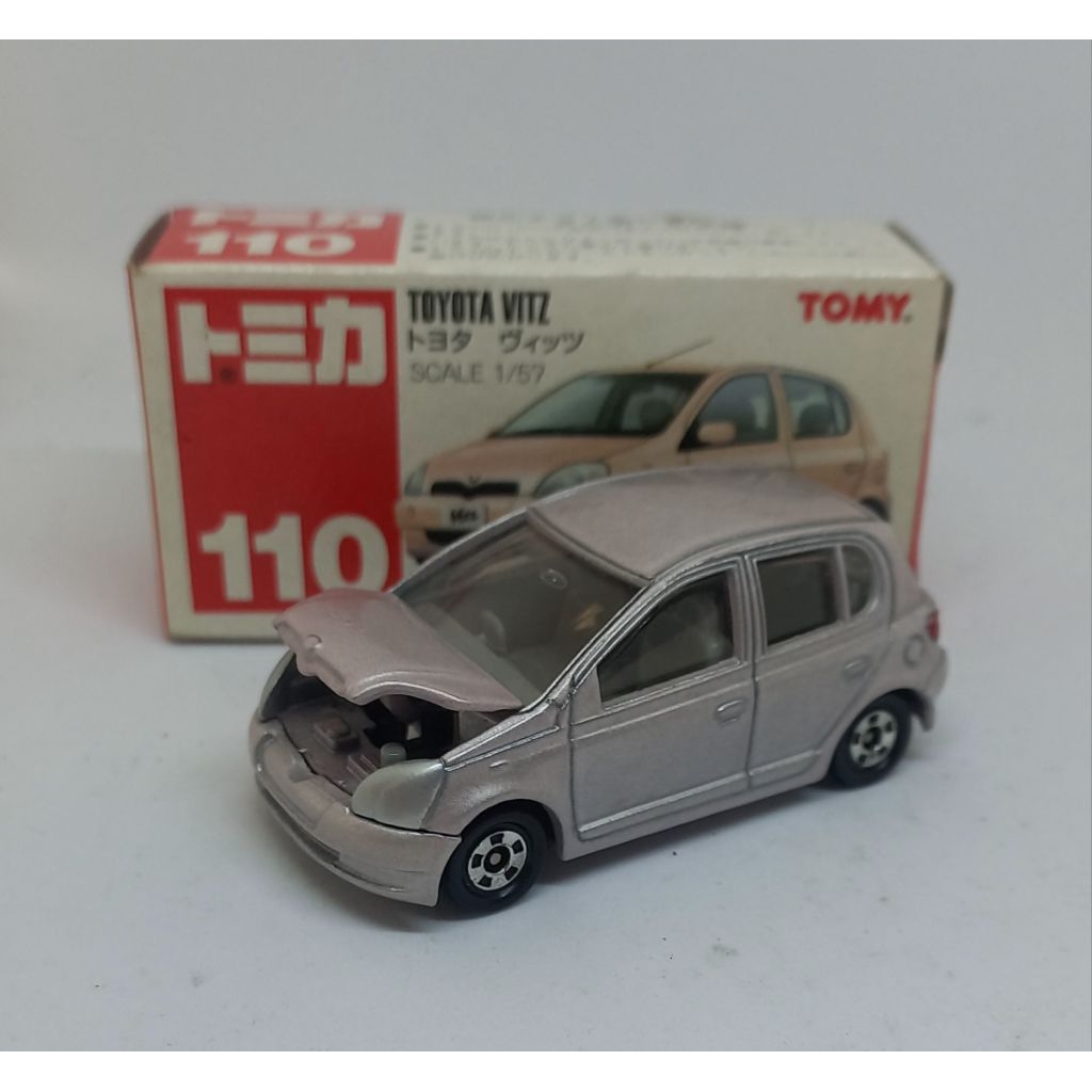 tomica toyota vitz 110 tomy merah diecast (t)