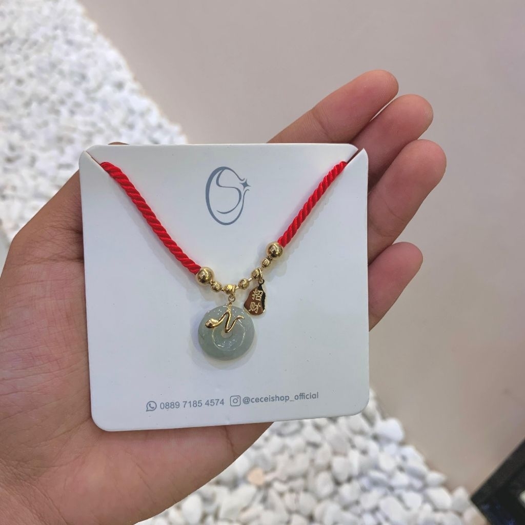 Gelang titanium guangzhou tali merah batu giok