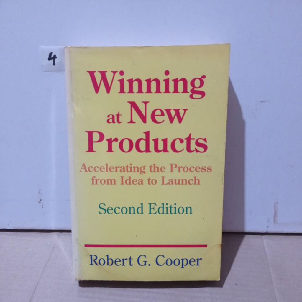 BUKU WINNING AT NEW PRODUCTS.  ACCELERATING THE PROCESS FROM IDEA TO LAUNCH.     ROBERT G. COOPER